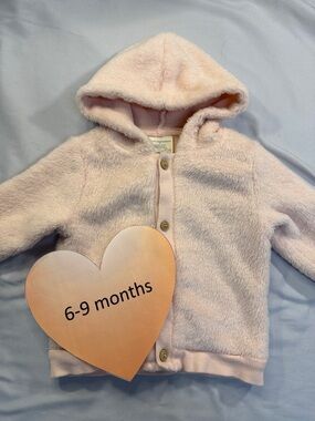 First Impressions - pink fuzzy fleece hooded jacket. Size 6 to 9 months